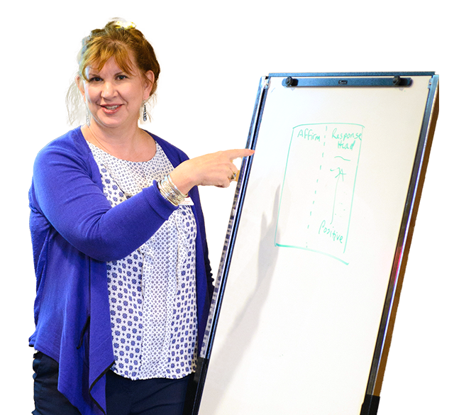 Amy Teaching Doula Courses With Whiteboard