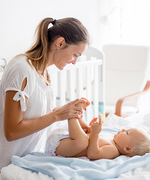 Birthing Parent Changing Baby Diaper