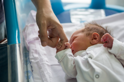 Newborn holding finger - jpg